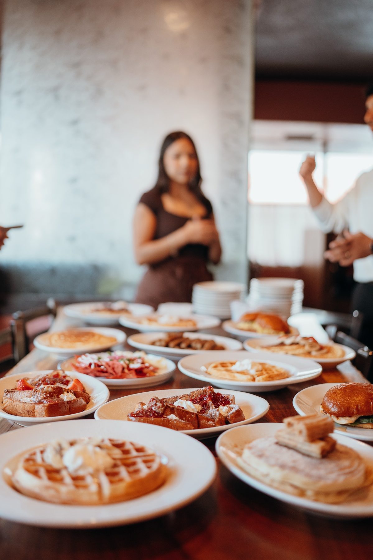 A table spread with Canela's brunch dishes